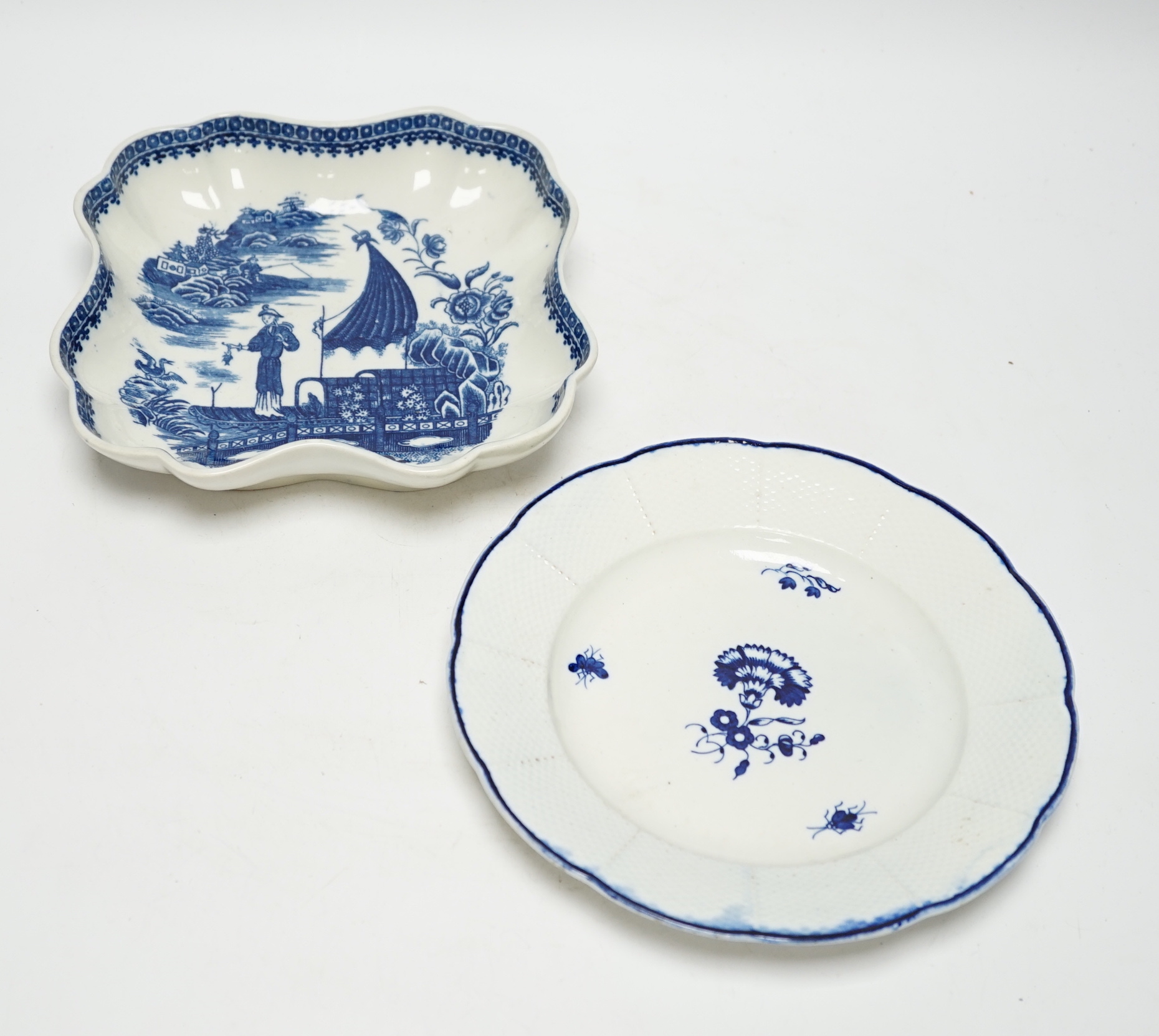 A Caughley carnation pattern plate, c.1765-70 and a fisherman pattern dessert dish c.1780, plate 21.5cm